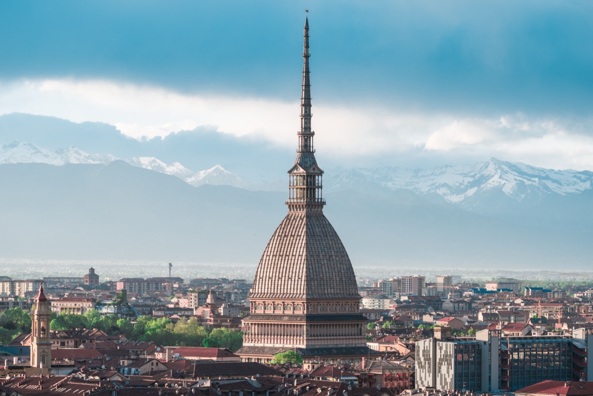 The Mole Antonelliana above Turin's rooftops at sunset